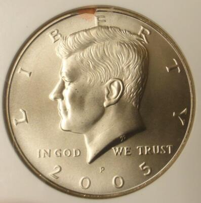 2005 Kennedy half dollar missing clad layer error showing copper-colored reverse surface compared to normal clad appearance