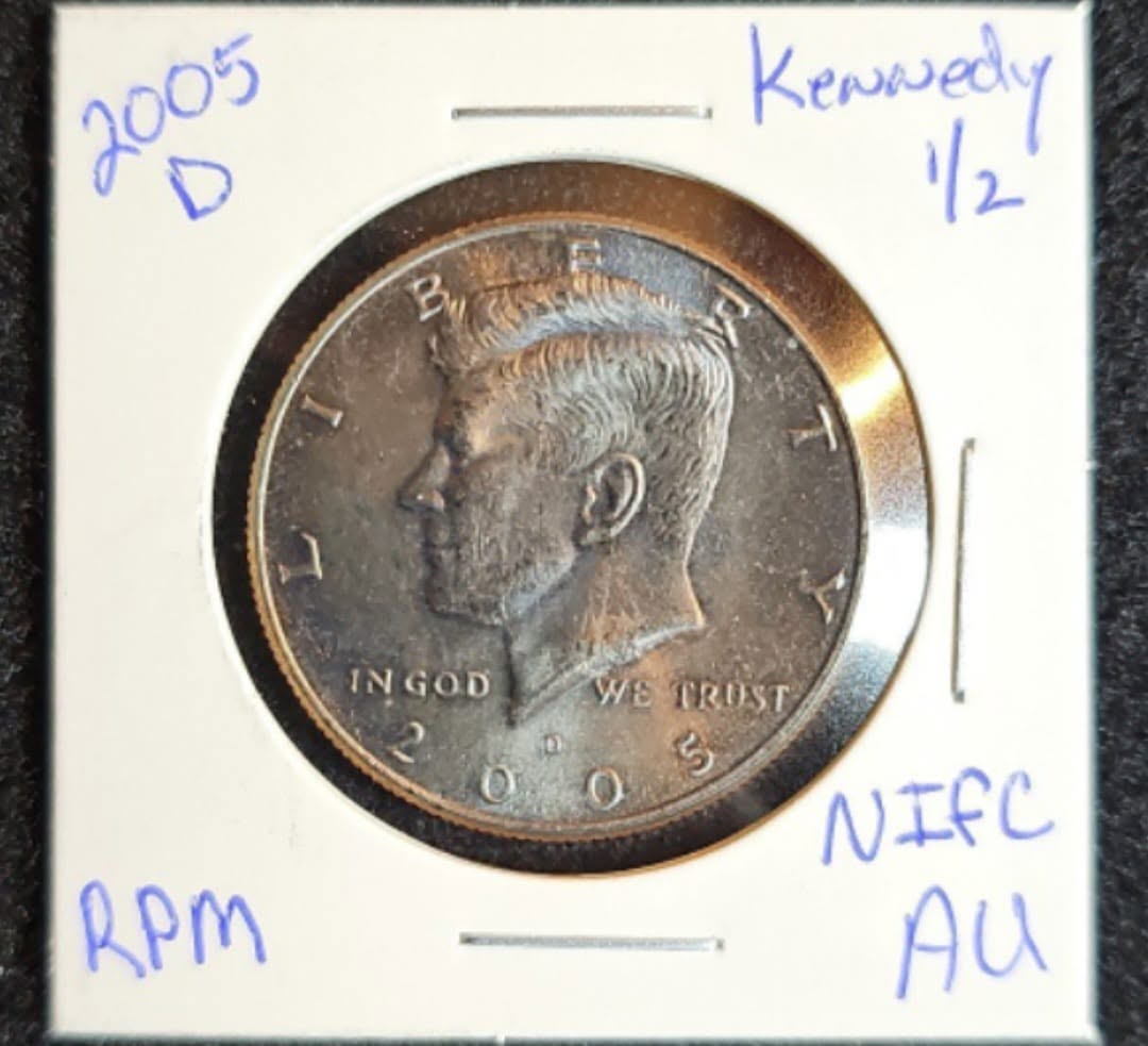 2005 Kennedy half dollar repunched mint mark RPM close-up showing secondary shadow behind the D mint mark